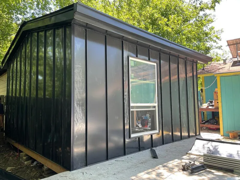 Black standing seam metal wall panels for Metal Roof Installation in Avenal